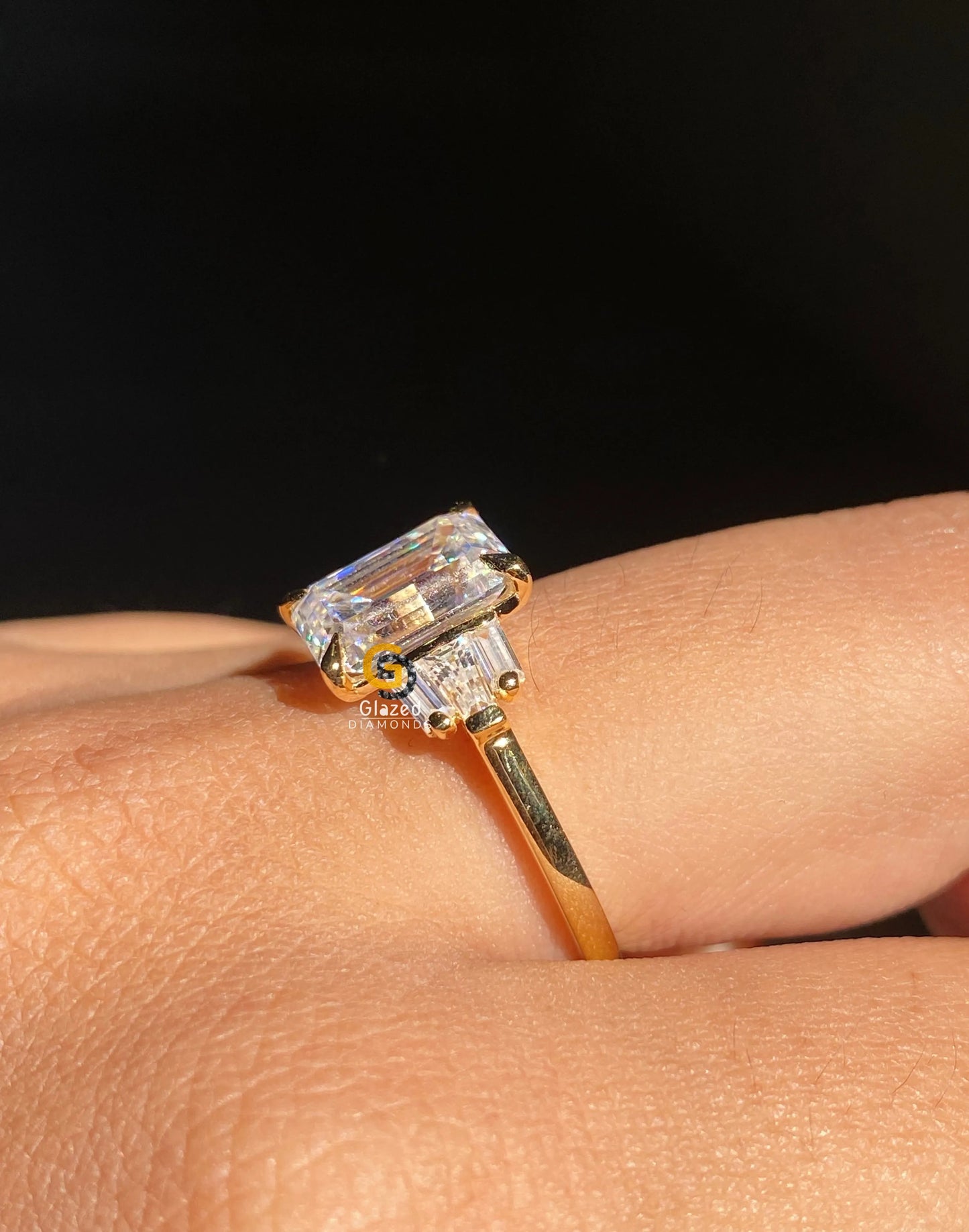 Emerald Cut Three Stone Moissanite Ring