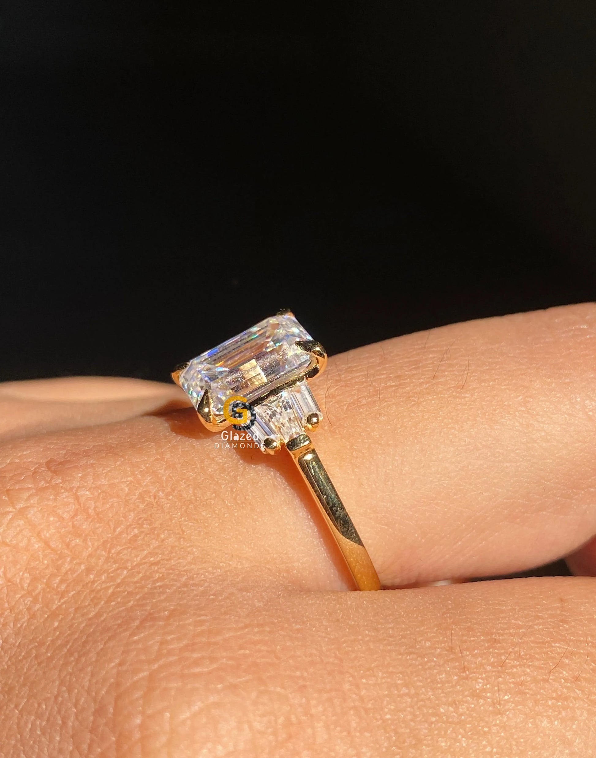 Emerald Cut Three Stone Moissanite Ring