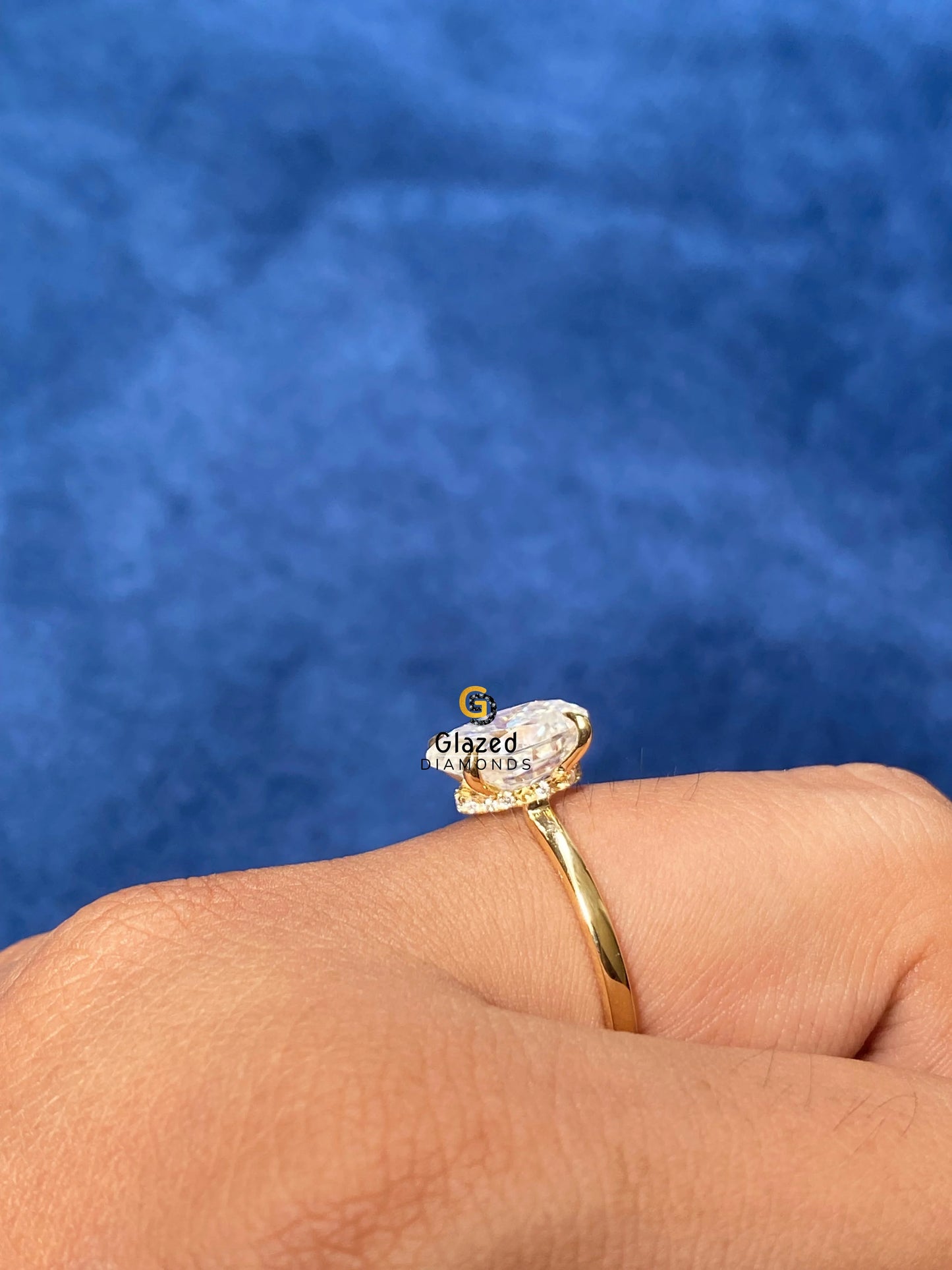 10x7MM Oval Cut Solitaire Hidden Halo Ring