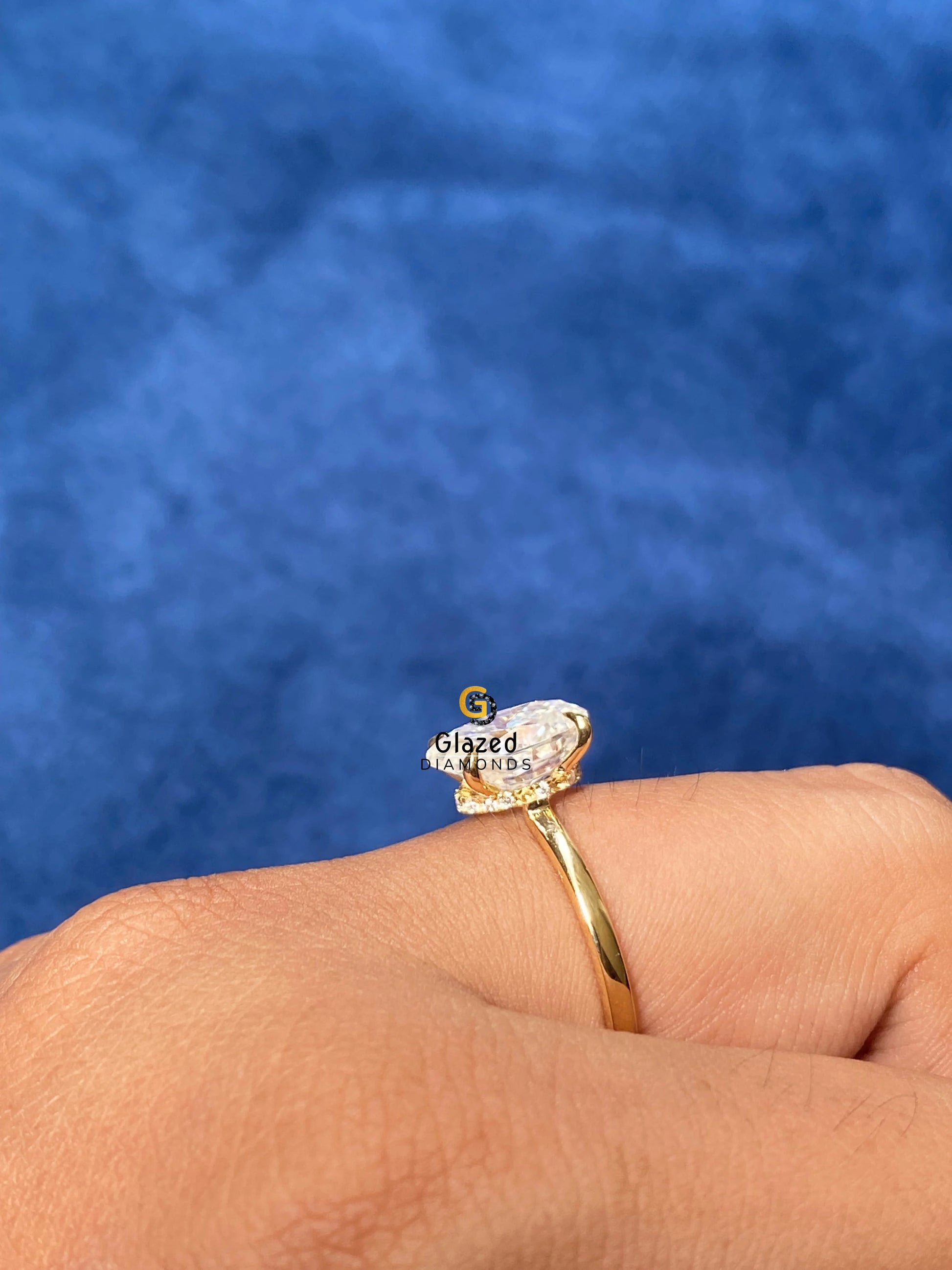 10x7MM Oval Cut Solitaire Hidden Halo Ring