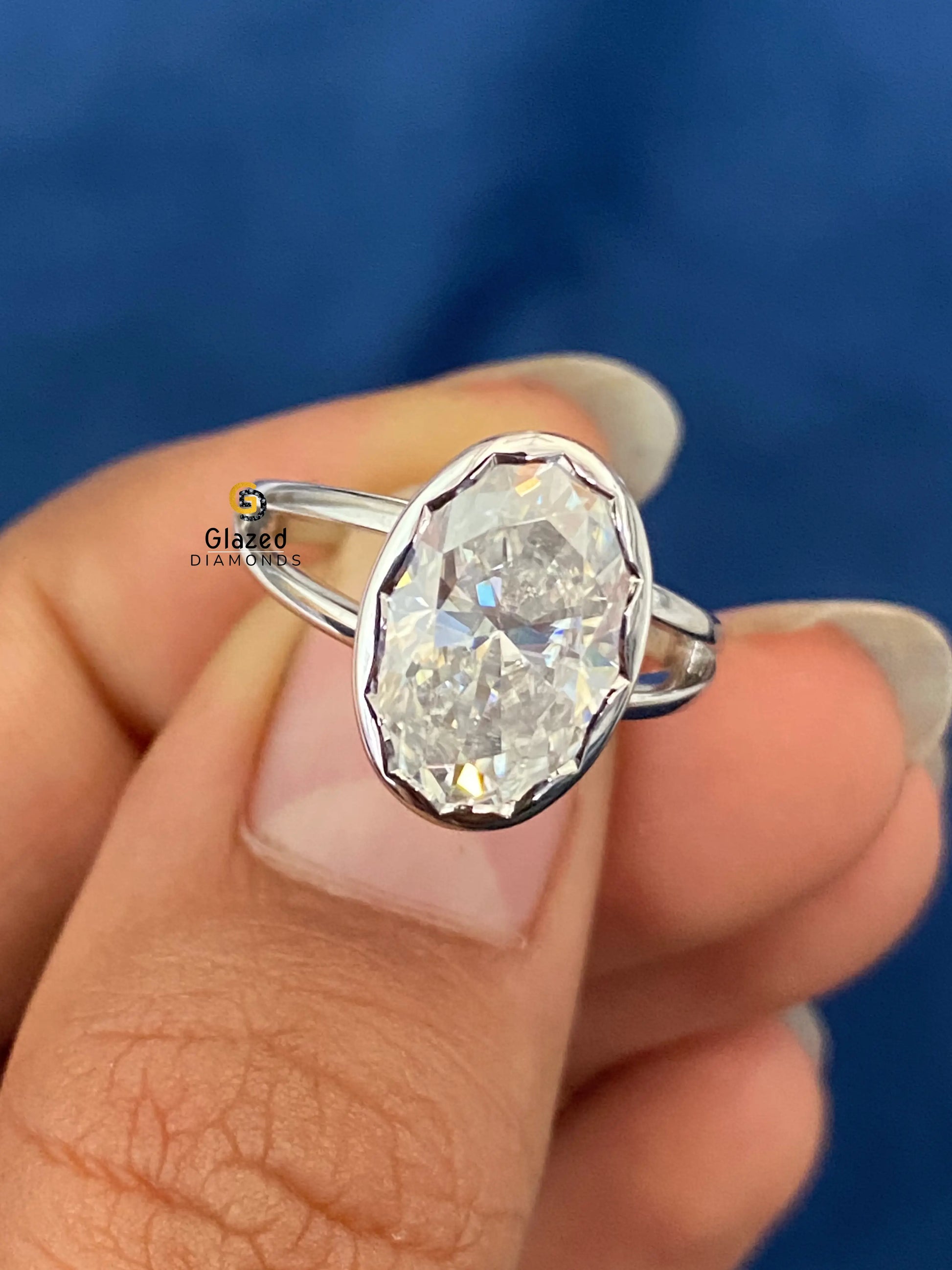 Oval Abstract Bezel Set Solitaire Moissanite Ring