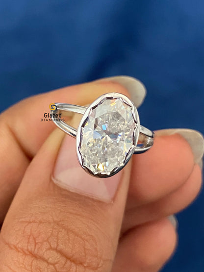 Oval Abstract Bezel Set Solitaire Moissanite Ring
