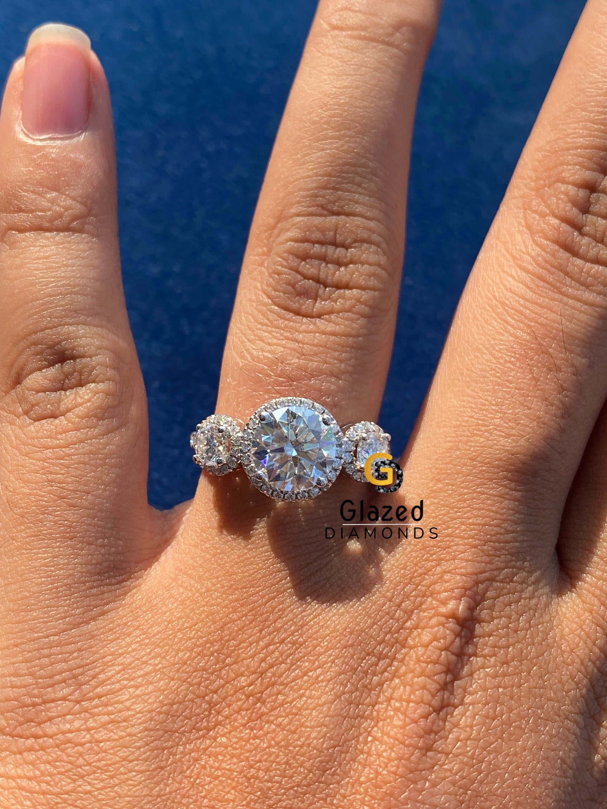 Round Three Stone Moissanite Rings