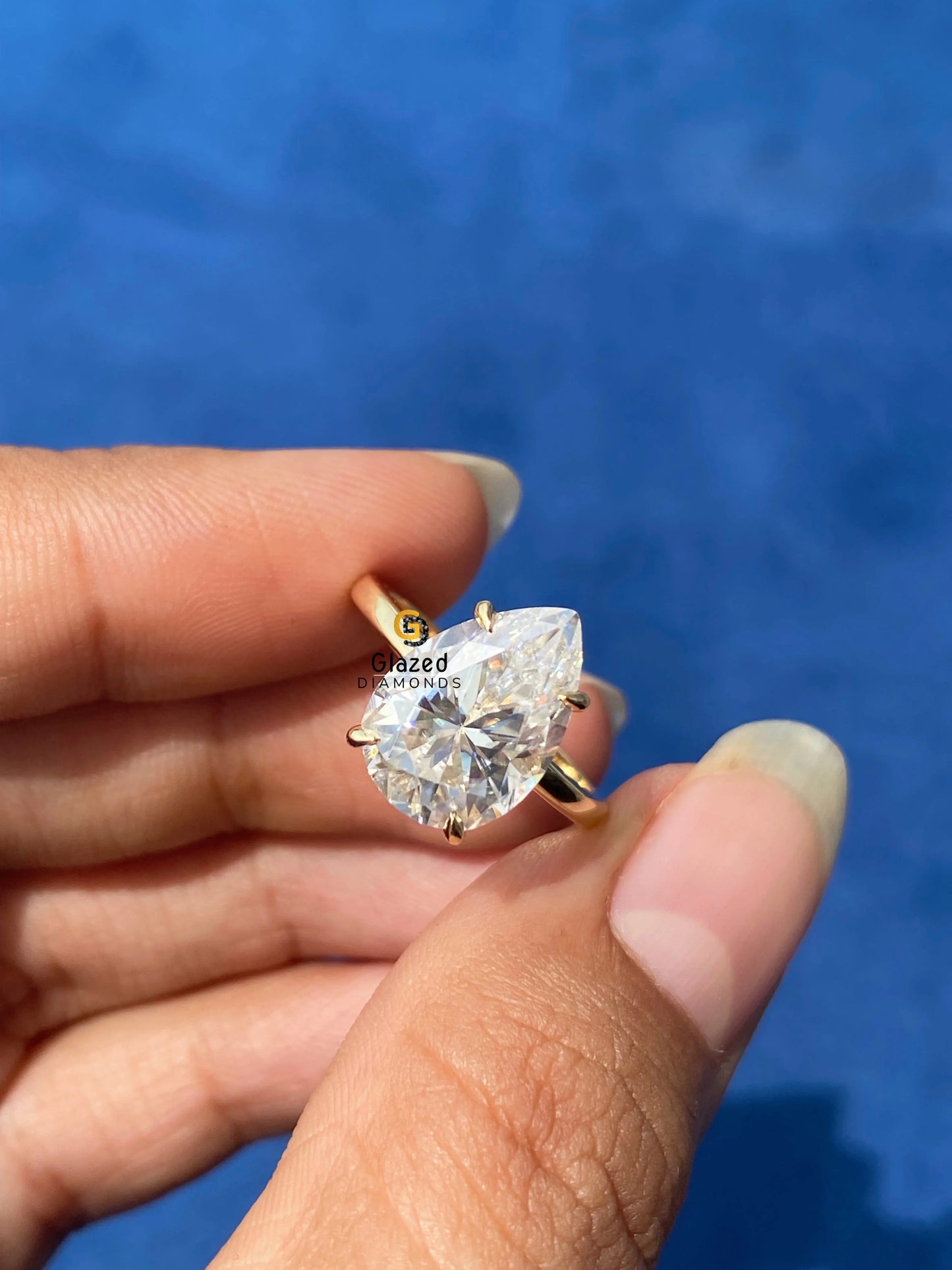 Solitaire Pear Cut Moissanite Engagement Ring
