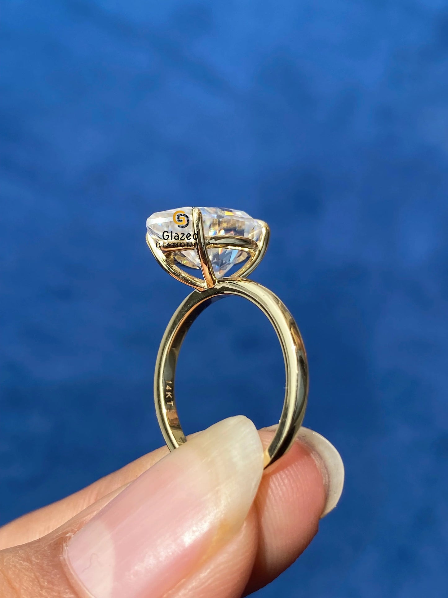 Solitaire Pear Cut Moissanite Ring