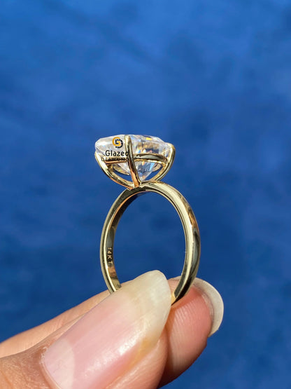 Solitaire Pear Cut Moissanite Ring